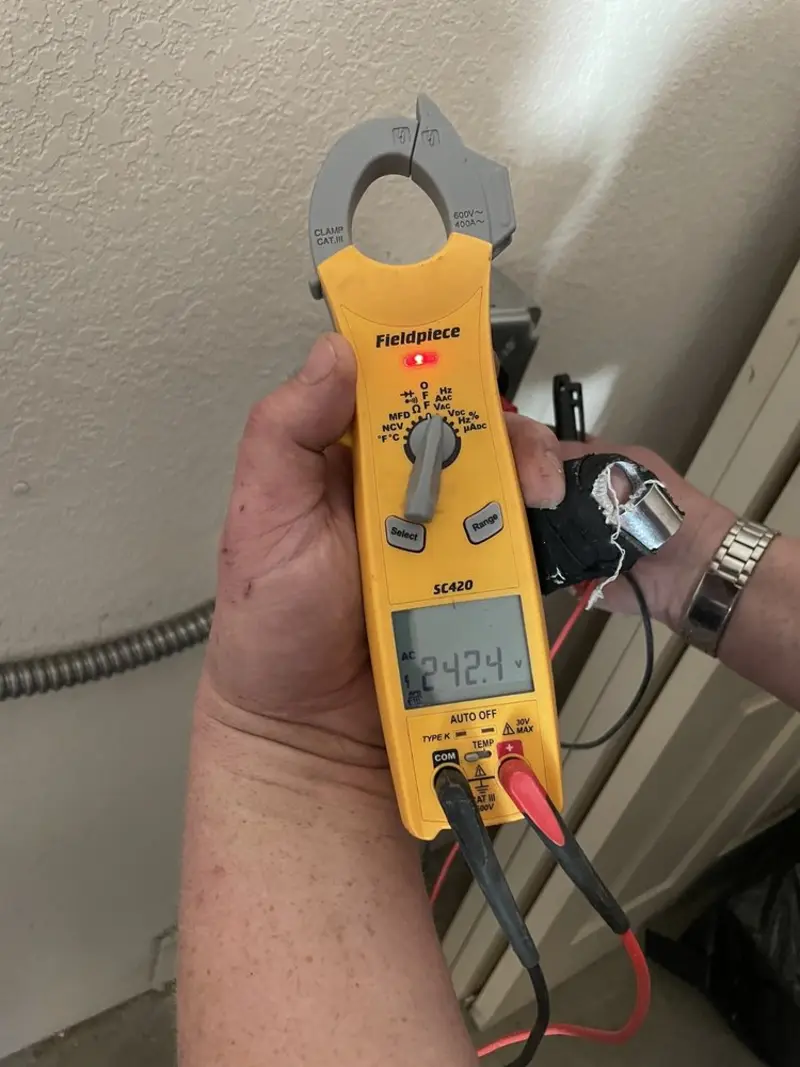 Voltage testing with clamp meter during Generator Installation in Waxhaw